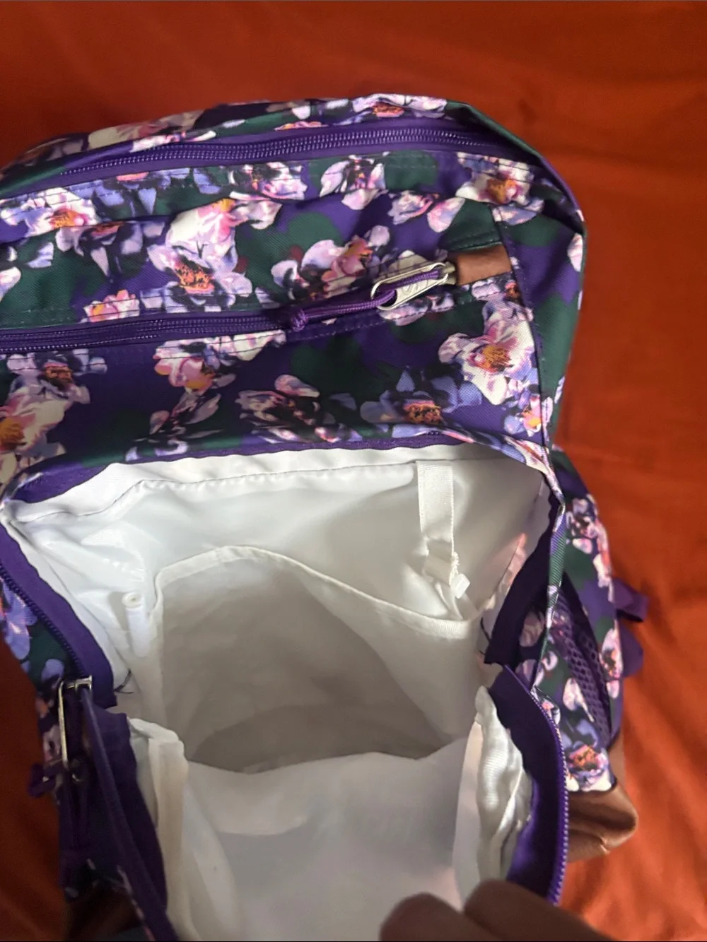 Jansport Purple Floral Backpack with Green Accents and Brown Base